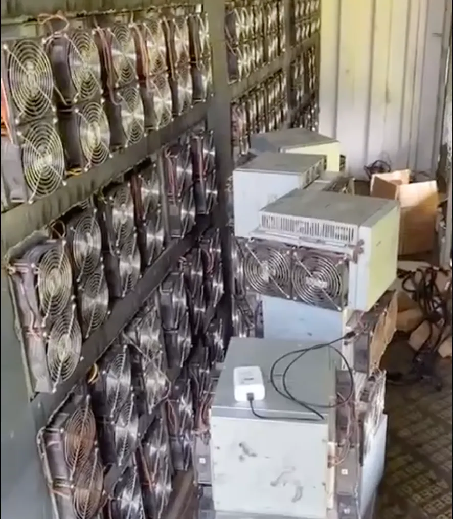 Avalon miners in our container and some that are piled up waiting to be installed.